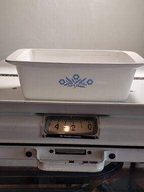 Vintage White Casserole Dish with Blue Floral Motif.  P-315